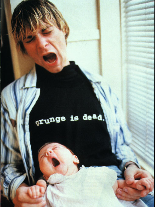 Kurt Cobain and his daughter, Frances Bean Cobain. Notice Kurt's shirt!